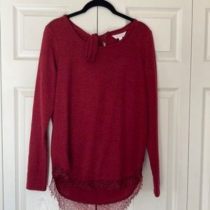 Red shimmery sweater